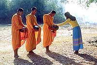 Buddhist Monks collecting food in the morning